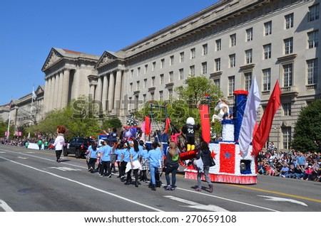 WASHINGTON, DC - APRIL 11: Cherry Blossom Parade on April 11, 2015 in Washington DC,USA.The parade is a spring celebration in Washington D.C.and people from all over the world come to watch the event
