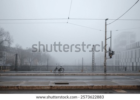 Similar – Foto Bild Fahrrad auf dunkler Straße geparkt