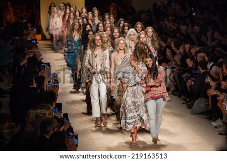 MILAN, ITALY - SEPTEMBER 19: models walk the runway during the Etro Ready to Wear show as a part of Milan Fashion Week Womenswear Spring/Summer 2015 on September 19, 2014 in Milan, Italy.