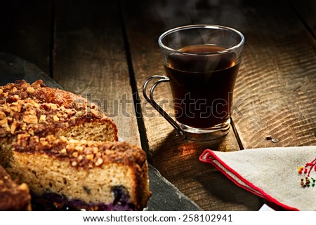 Hot Coffee with Crumb Cake in Rustic Setting
