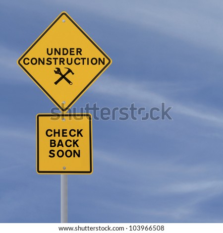 Under construction sign on a blue sky background (with copy space). Applicable for website and web page status updates.