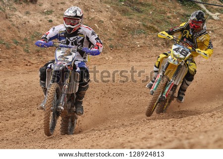 ALBAIDA, SPAIN - FEBRUARY 17:An unidentified riders of motorcycling in the Spanish championship of motocross on February 17, 2013, Albaida, Spain