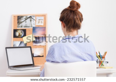 Young woman working in creative desktop