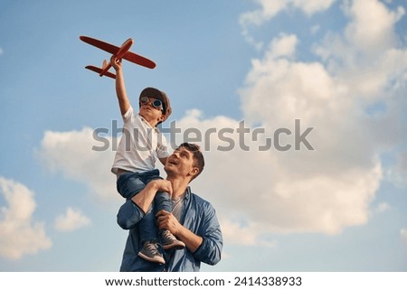 Similar – Image, Stock Photo Father and kid having fun on beach