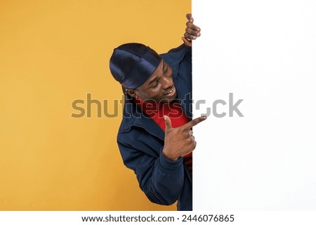 Similar – Image, Stock Photo Young ethnic man behind wire fence