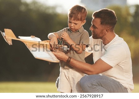 Similar – Image, Stock Photo Boy child using screwdriver at home