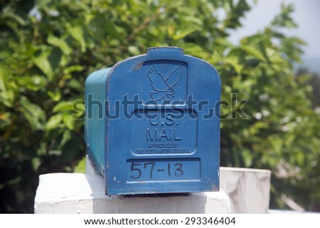 Mail Box In front of a House