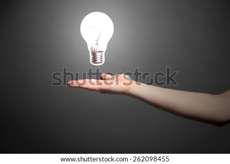 light bulb as hand