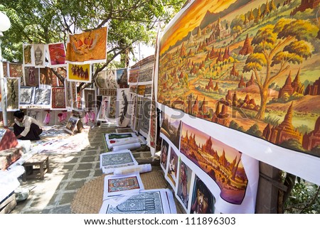 BAGAN, MYANMAR - FEB 15: Sand paintings for sale on Feb 15, 2011 in Bagan, Myanmar. Sand paintings are popular because they are made using sand-covered cloth as a medium rather than ordinary canvas