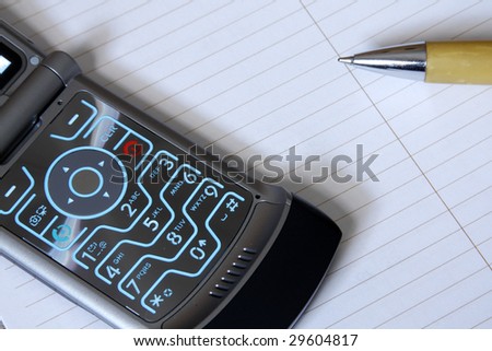Cell phone with note pad