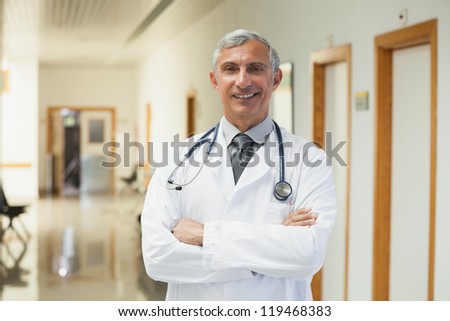 Doctor smiling in the corridor of the hospital