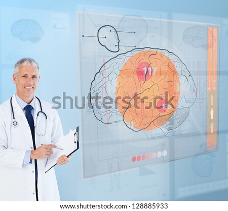Smiling doctor using a futuristic interface for brain analysis