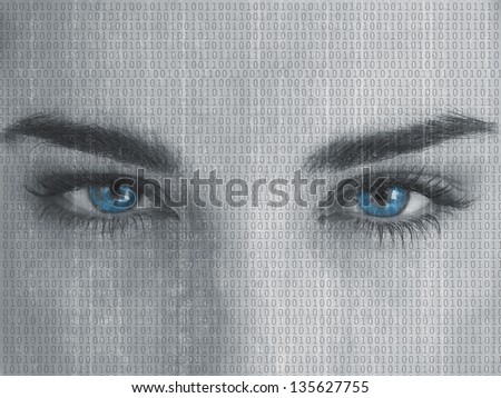 Attractive blue eyed woman with binary code on face close up staring at camera