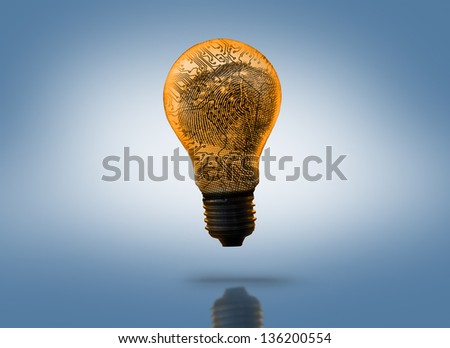 Orange circuit board light bulb against blue background