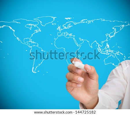 Businessman drawing world map on white background