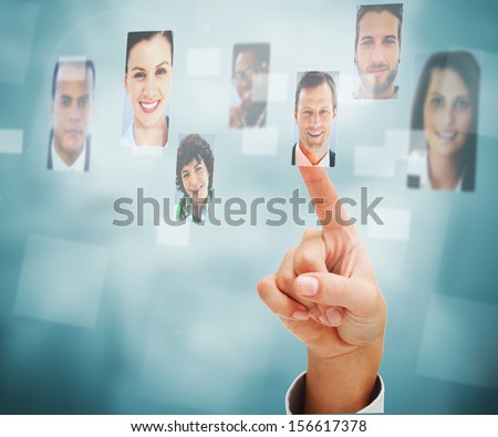 Female finger selecting profile picture on digital interface
