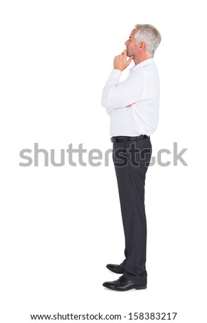 Thoughtful businessman posing on white background