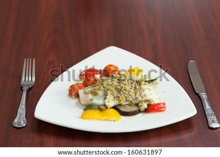 Front view of delicious fish meal on wooden table