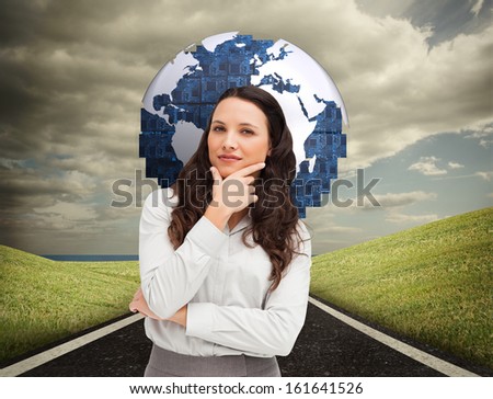 Composite image of portrait of a businesswoman posing against a white background