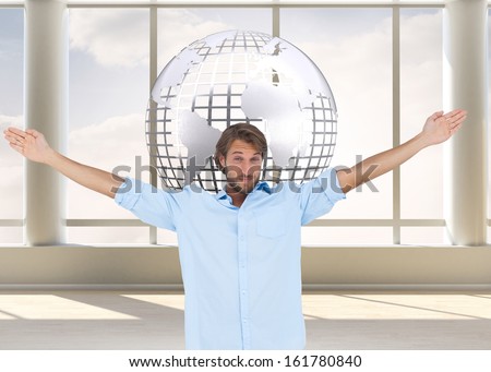 Composite image of handsome man raising hands and smiling