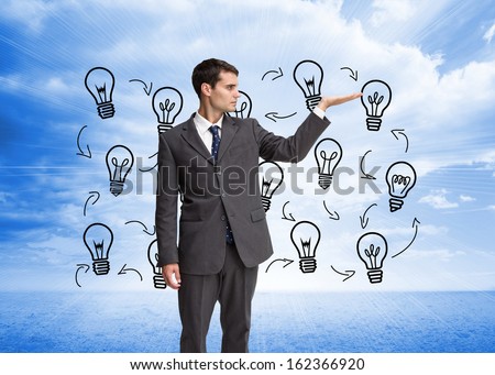 Composite image of stern attractive businessman presenting