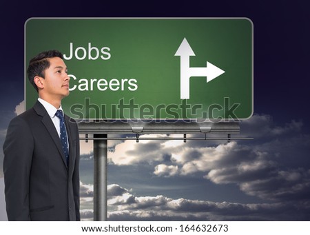 Composite image of signpost showing the direction of jobs and careers with sky in the background