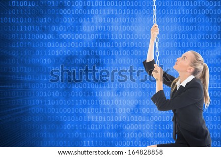 Composite image of blonde businesswoman pulling a chain