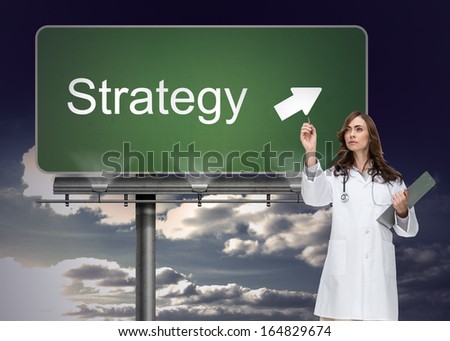 Composite image of stern brunette doctor pointing