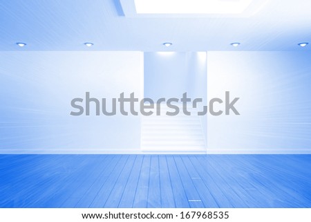 Bright blue room with staircase