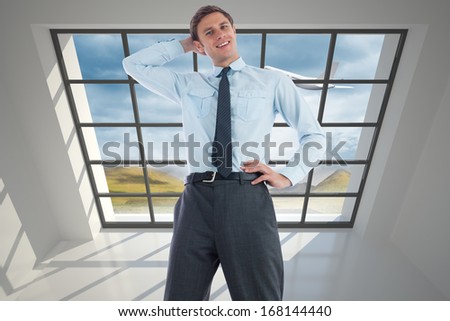 Thinking businessman with hand on head against airplane flying past window