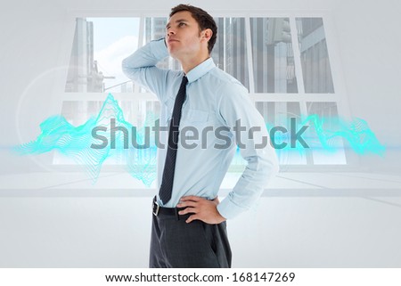 Thinking businessman with hand on head against abstract design in blue