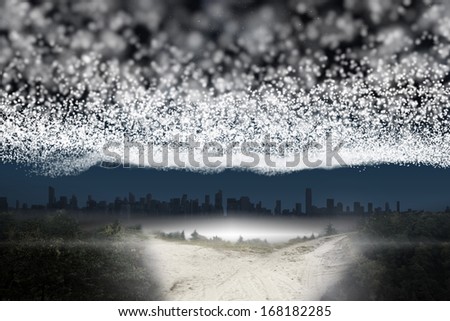 Blanket of stars above path leading to city