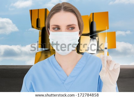 Young brunette female doctor holding a syringe  against balcony and cloudy sky