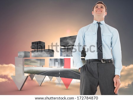 Happy businessman standing with hand in pocket against red and grey arrows pointing against sky