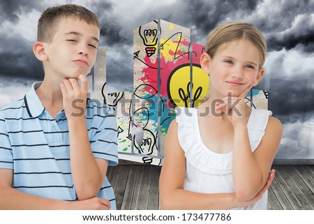 Thoughtful brother and sister posing together against sky painted on wall