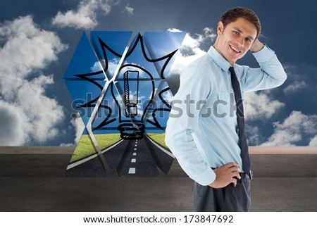 Thinking businessman with hand on head against balcony and cloudy sky