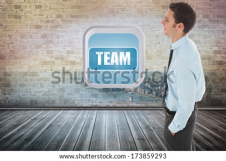 Happy businessman standing with hand in pocket against city scene in a room