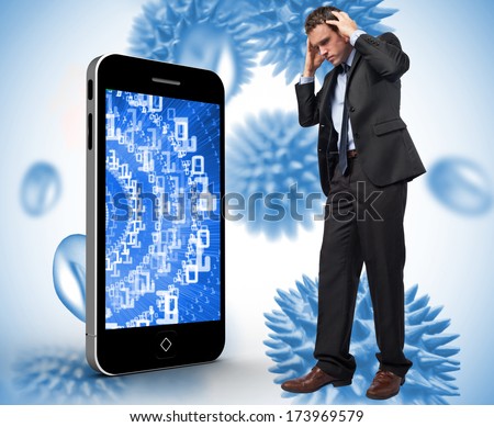 Stressed businessman with hands on head against blue virus cells