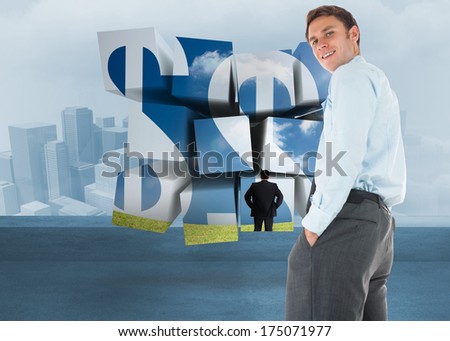 Happy businessman standing with hands in pockets against cityscape in the fog