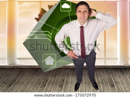 Thinking businessman scratching head against digital earth floating in room