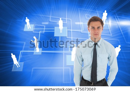 Serious businessman with hand in pocket against background with glowing squares