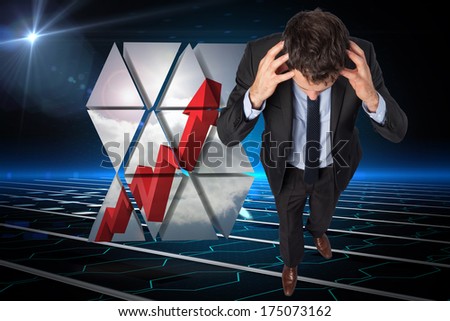Stressed businessman with hands on head against circuit board on futuristic background
