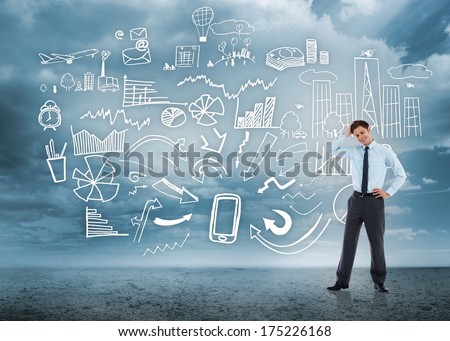 Thoughtful businessman with hand on head against brainstorm on desert landscape