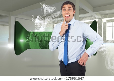 Thinking businessman touching his chin against abstract white design in room