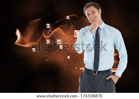 Thoughtful businessman with hand on chin against file transfer background