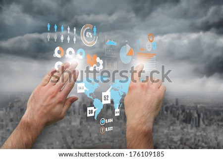 Hands pointing and presenting against gloomy city