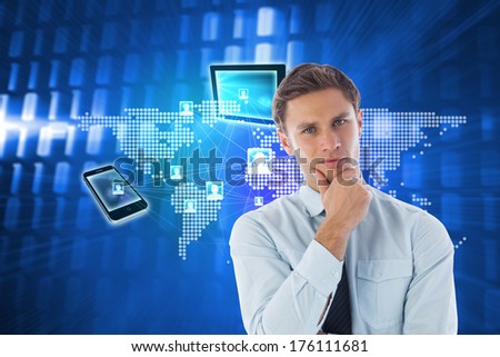Thinking businessman with hand on chin against glowing squares on blue background