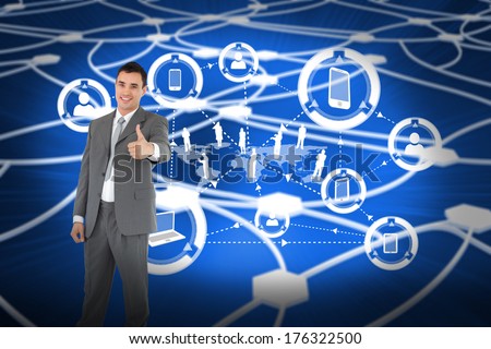 Businessman thumb up against glowing dots connected with lines