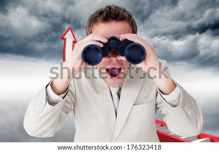Positive businessman using binoculars against red stairs arrow pointing up against sky