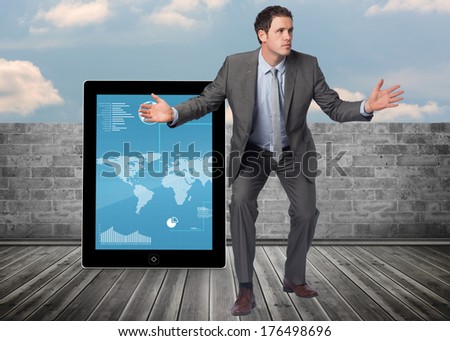 Businessman standing with arms out against brick lined wall covering half sky